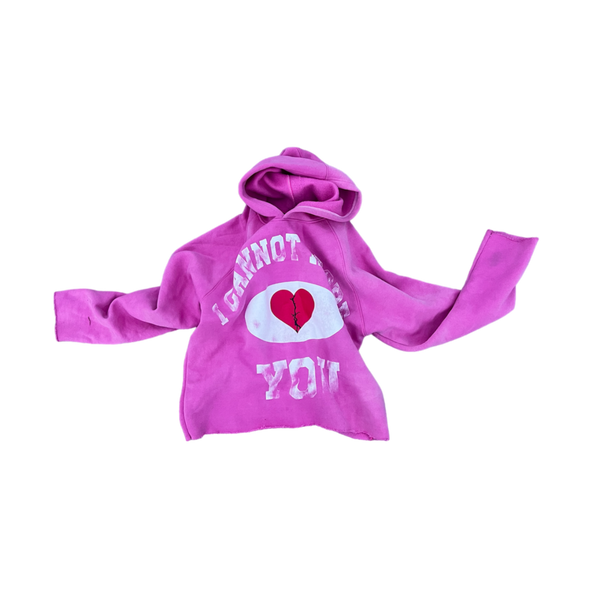 Pink hoodie with a broken heart and 'I CANNOT ADORE YOU' text design